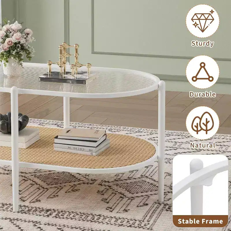 Tavolino ovale a 2 livelli con ripiano in vetro, mensola in rattan e struttura in metallo, nero/bianco